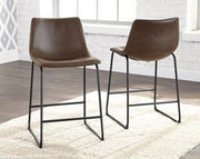 Ashley Furniture Centiar counter height bar stool with wooden frame and cushioned seat, shown in a modern kitchen setting.
