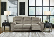 Ashley Furniture Next-Gen Gaucho Reclining Sofa with plush cushions and modern design, shown in a living room setting.