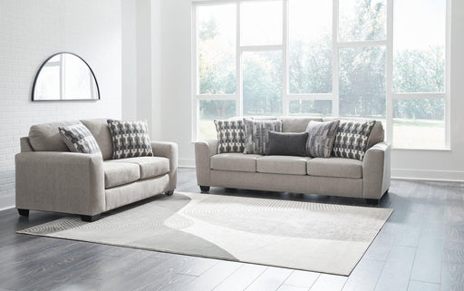 Ashley Furniture Avenal Park living room set with sofa and armchair in a modern design, shown in a cozy home setting.