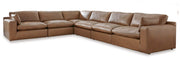 Ashley Furniture Emilia Sectional in neutral fabric, featuring plush cushions and modern design for stylish living room seating.