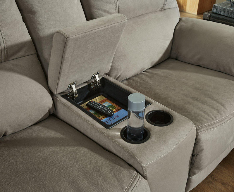 Ashley Furniture Next-Gen Gaucho Reclining Loveseat with console, featuring plush upholstery and built-in armrest storage.
