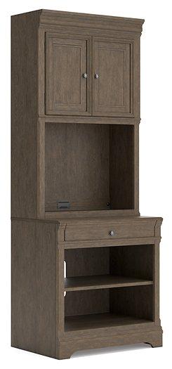Ashley Furniture Janismore Bookcase with open shelves and wood finish for stylish storage and display.
