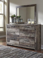 Ashley Furniture Derekson dresser with matching mirror, wooden storage unit with multiple drawers and a sleek, modern design.
