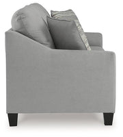 Ashley Furniture Adlai Sleeper Sofa showing a modern, upholstered sofa bed with clean lines and plush cushions in a living room setting.