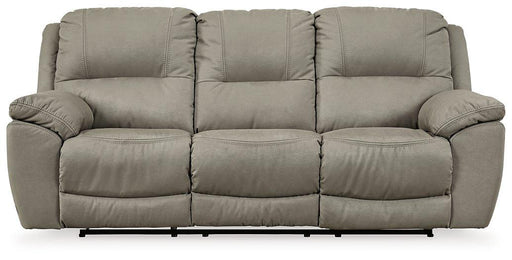 Next-Gen Gaucho reclining sofa by Ashley Furniture, featuring plush upholstery, wide armrests, and modern design.