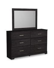 Ashley Furniture Belachime bedroom set with a modern bed frame, matching nightstands, and dresser in a stylish bedroom scene.