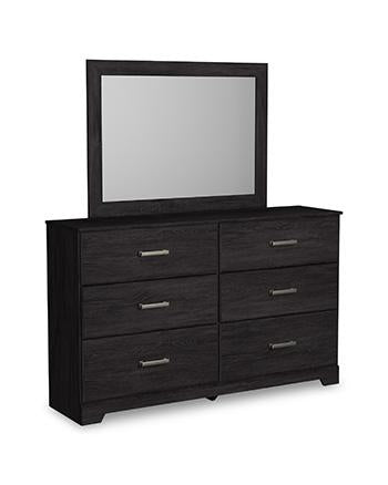 Ashley Furniture Belachime bedroom set with a modern bed frame, matching nightstands, and dresser in a stylish bedroom scene.