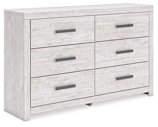Ashley Furniture Cayboni Dresser with multiple drawers and modern design, shown in a well-lit room.