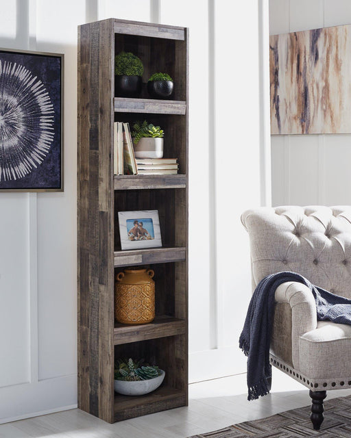 Ashley Furniture Derekson Pier TV stand with open shelves and storage drawers in a modern wood finish.