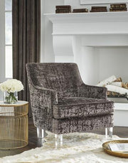 Ashley Furniture Gloriann Accent Chair with plush fabric and wooden legs, stylishly designed for modern living spaces.