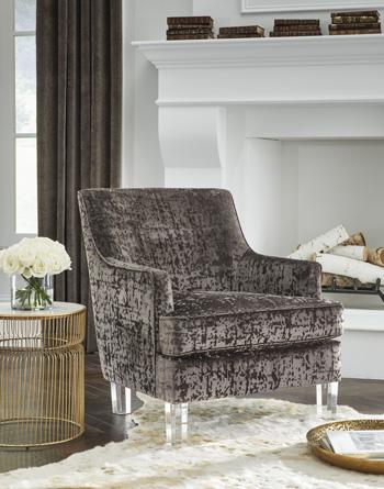 Ashley Furniture Gloriann Accent Chair with plush fabric and wooden legs, stylishly designed for modern living spaces.