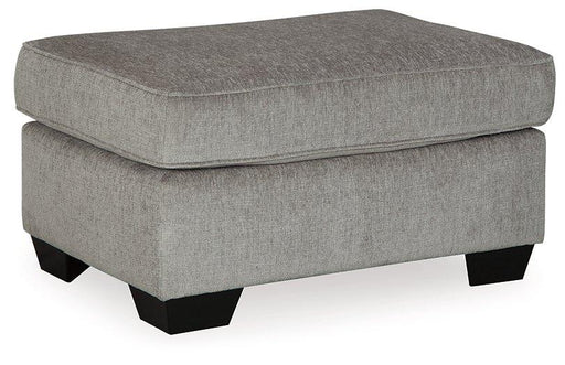 Ashley Furniture Altari Ottoman featuring a plush upholstered top and wooden legs, ideal for living room decor.