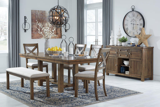 Ashley Furniture Moriville dining room set with a wooden table and six upholstered chairs in a modern dining space.