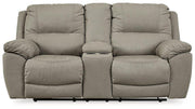 Ashley Furniture Next-Gen Gaucho Reclining Loveseat with Console showing plush fabric, padded armrests, and built-in console for comfort.