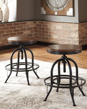 Ashley Furniture Valebeck counter height bar stool with wooden legs and upholstered seat, ideal for kitchen or bar area.