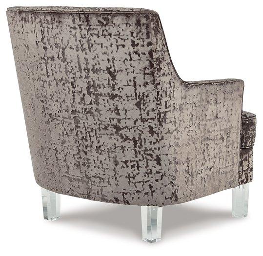 Ashley Furniture Gloriann accent chair with plush beige upholstery and wooden legs, stylishly designed for living room decor.
