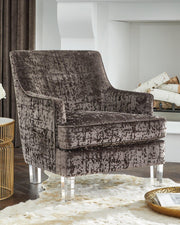 Ashley Furniture Gloriann accent chair with plush fabric and stylish design, shown in a contemporary living room setting.