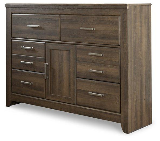 Ashley Furniture Juararo Dresser with sleek wood finish and multiple drawers for stylish storage in a modern bedroom.