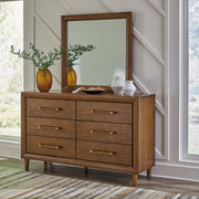 Ashley Furniture Lyncott dresser and mirror set featuring a sleek wooden dresser with a matching mirror on top.