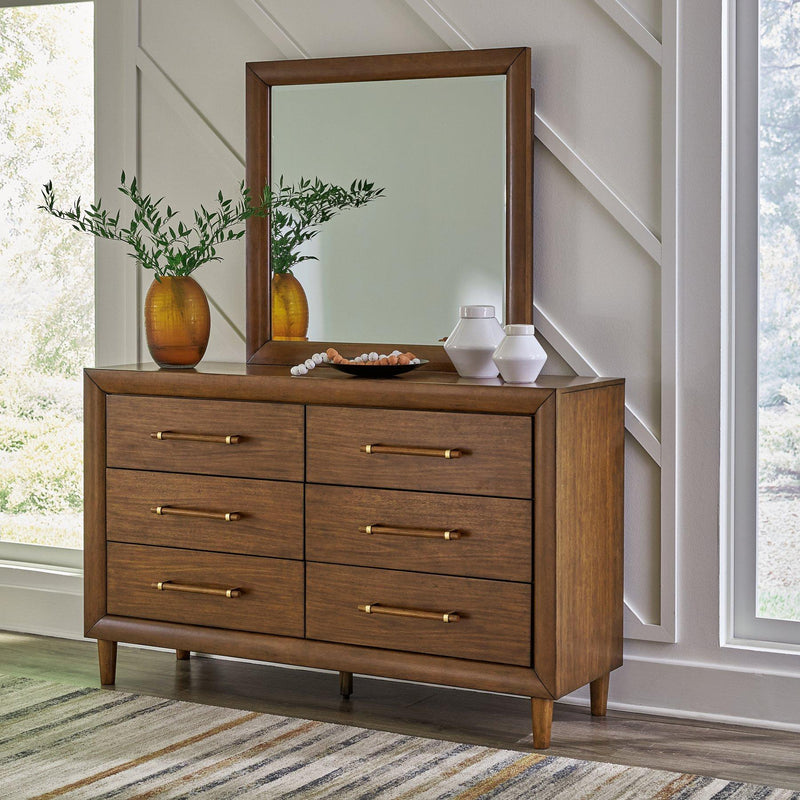 Ashley Furniture Lyncott dresser and mirror set featuring a sleek wooden dresser with a matching mirror on top.