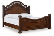 Ashley Furniture Lavinton bedroom set featuring a wooden bed frame, matching nightstands, and a dresser with a mirror.