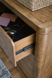 Ashley Furniture Cabalynn dresser and mirror set, featuring a sleek wooden dresser with a matching framed mirror for bedroom decor.