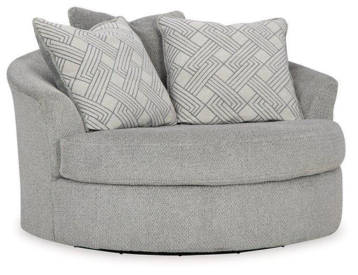 Oversized Ashley Furniture Casselbury swivel accent chair with plush upholstery and modern design, perfect for living room seating.