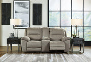 Ashley Furniture Next-Gen Gaucho Reclining Loveseat with Console showing plush cushions, reclining seats, and built-in storage console.