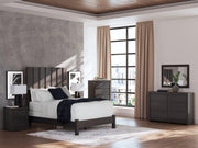 Ashley Furniture Fraluna dresser with multiple drawers in a modern wooden finish, showcasing sleek design and sturdy construction.