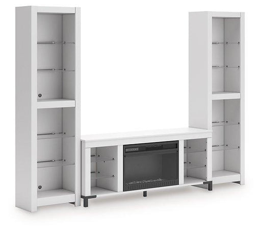 Ashley Furniture Brollevi Entertainment Center with open shelves and cabinets in a modern wooden design.