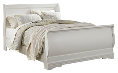 Ashley Furniture Anarasia Bed with upholstered headboard and wood frame, shown in a stylish bedroom setting.