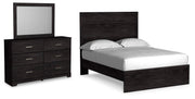 Ashley Furniture Belachime bedroom set with a bed, nightstands, and dresser in a modern, elegant design.