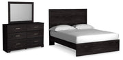 Ashley Furniture Belachime bedroom set with a stylish bed frame, matching nightstands, and coordinated bedroom decor.