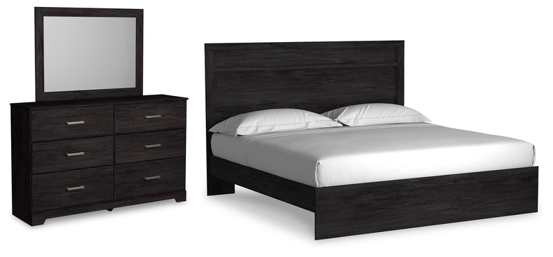 Ashley Furniture Belachime bedroom set with a bed frame, nightstands, and dresser in a modern, elegant bedroom design.