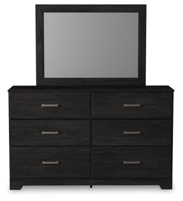 Ashley Furniture Belachime bedroom set featuring a modern bed frame with a padded headboard and matching nightstands.