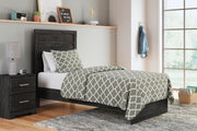 Ashley Furniture Belachime bedroom set featuring a classic bed frame, matching nightstands, and dresser in a stylish design.