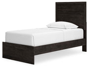 Ashley Furniture Belachime bedroom set with a modern bed frame, matching nightstands, and a sleek, coordinated bedroom furniture design.