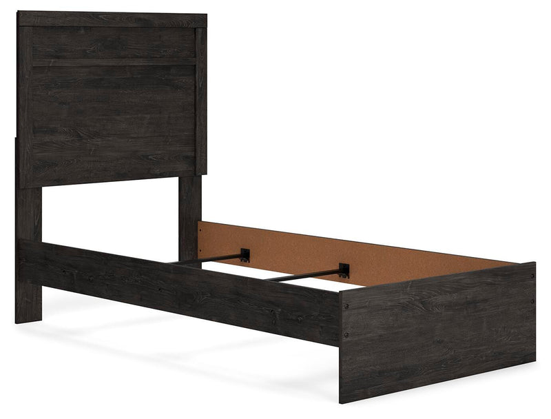 Ashley Furniture Belachime bedroom set featuring a modern bed frame, nightstands, and matching dresser in a stylish bedroom setup.