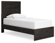 Ashley Furniture Belachime bedroom set showing a stylish bed frame with matching nightstands and a contemporary bedroom design.