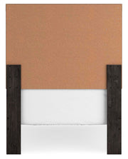 Ashley Furniture Belachime bedroom set featuring a bed frame with matching nightstands and dresser in a modern design.