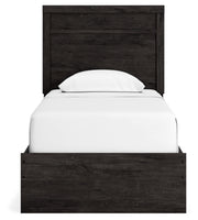 Ashley Furniture Belachime bedroom set featuring a modern bed with a headboard, nightstands, and coordinated bedroom furniture.