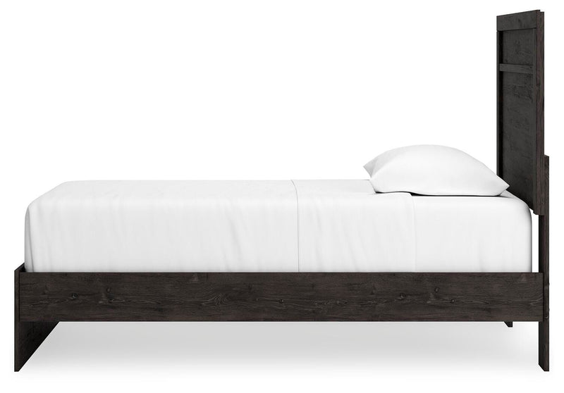 Ashley Furniture Belachime bedroom set featuring a bed frame, nightstands, and dresser in a modern bedroom design.