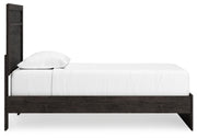 Ashley Furniture Belachime bedroom set featuring a bed frame, nightstands, and dresser in a modern bedroom setup.