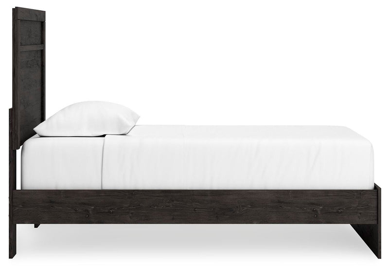 Ashley Furniture Belachime bedroom set featuring a bed frame, nightstands, and dresser in a modern bedroom setup.