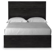 Ashley Furniture Belachime Bed with headboard and detailed wood finish, showcasing a stylish and elegant bedroom centerpiece.