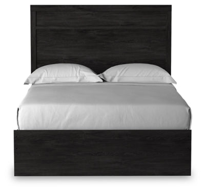 Ashley Furniture Belachime Bed with headboard and detailed wood finish, showcasing a stylish and elegant bedroom centerpiece.
