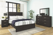 Ashley Furniture Belachime bedroom set featuring a bed frame, nightstands, and matching dresser in a modern design.