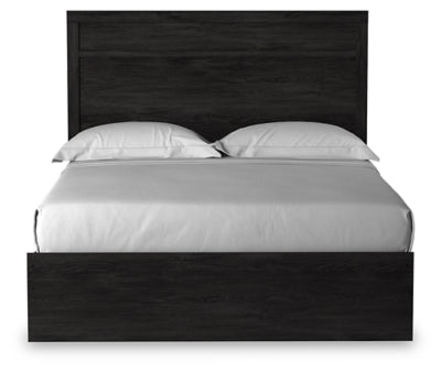 Ashley Furniture Belachime Bed with headboard and frame, shown from a front-on angle in a warm wood finish.