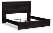 Ashley Furniture Belachime bedroom set featuring a bed, nightstands, and dresser in a stylish bedroom arrangement.