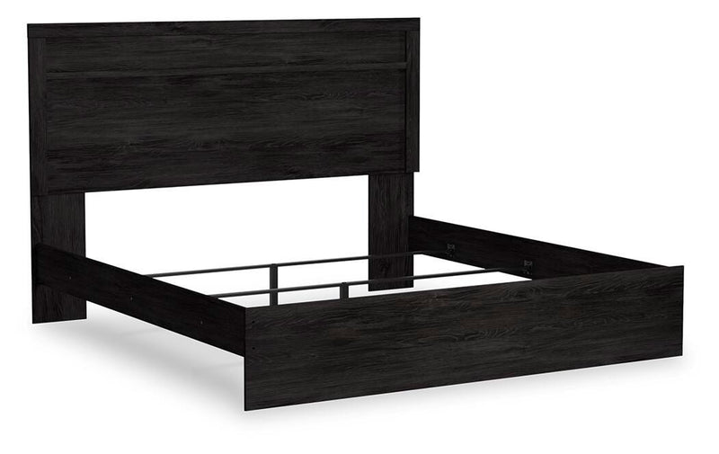 Ashley Furniture Belachime bedroom set featuring a bed, nightstands, and dresser in a stylish bedroom arrangement.